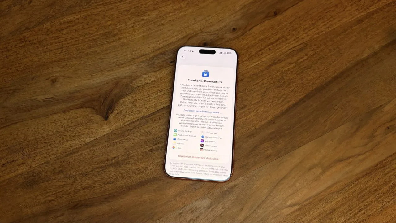 iPhone on a wooden table showing the Advanced Data Protection setting for iCloud – the feature at the centre of the iCloud backdoor dispute