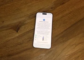 iPhone on a wooden table showing the Advanced Data Protection setting for iCloud – the feature at the centre of the iCloud backdoor dispute