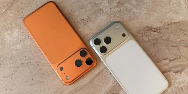 Two iPhones side by side on light marble as iPhone Handoff runs both under one phone number