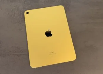 Yellow entry-level iPad seen from the back on a grey stone surface – for the code finding on the iPad mini 8 and iPad 12