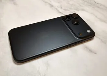 Black iPhone 18 Pro Max seen from the back on light marble, focusing on the camera system whose white balance and shutter speed can now be controlled manually on the iPhone 18 Pro
