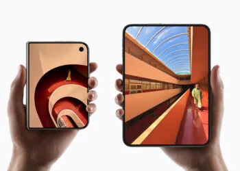 iPhone Duo held in two hands, folded with the outer display on the left and opened with the large inner display on the right