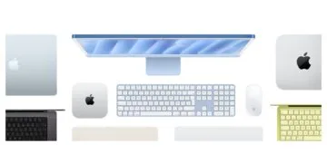 Mac buying guide: top view of a blue iMac with keyboard and mouse, next to a Mac mini, other Macs and MacBooks in several colours