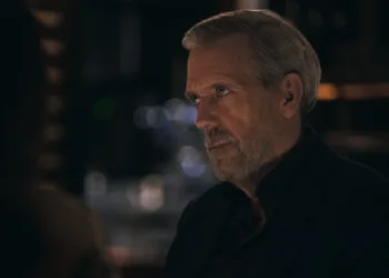 Hugh Laurie as crime boss Felix Carmichael in an evening scene from The Wanted Man on Apple TV