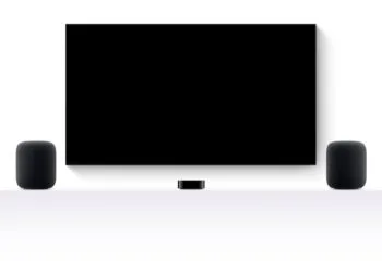 tvOS 27.2 HomePod surround: two HomePods to the left and right of a TV, with an Apple TV 4K in between on a white sideboard