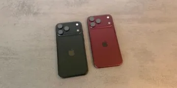 Apple stock price target: two iPhone 18 Pro Max in black and burgundy lying face down on a grey stone surface