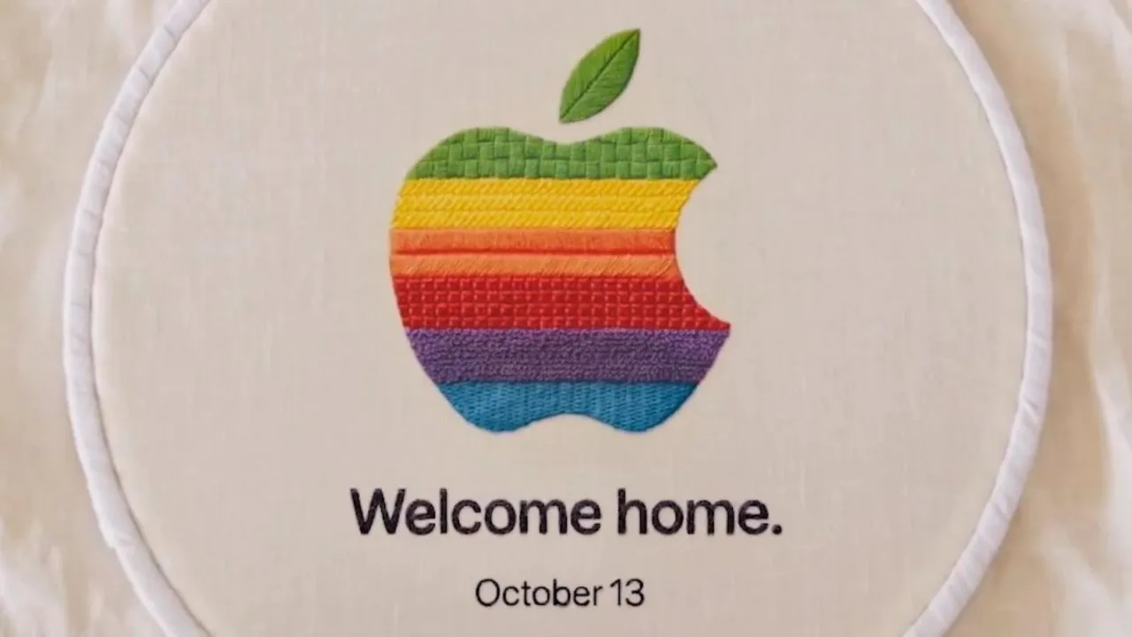 Apple event October 13: Embroidered rainbow Apple logo in an embroidery hoop with the words “Welcome home.” and “October 13”