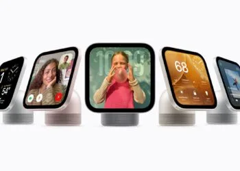 Five Apple HomeView units side by side, their screens showing time and weather, a FaceTime call, a photo, smart home controls and music