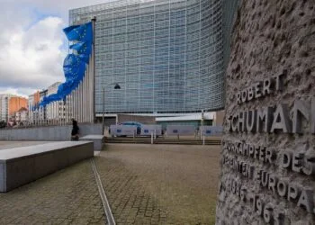 EU flags in front of the Berlaymont building in Brussels, headquarters of the European Commission targeted by Apple lobbying