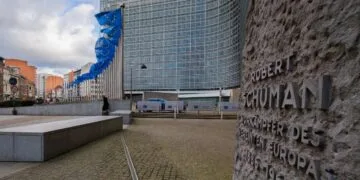 EU flags in front of the Berlaymont building in Brussels, headquarters of the European Commission targeted by Apple lobbying