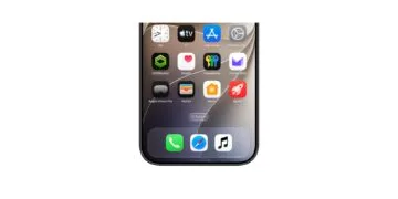 Apple Music app icon in iOS 27.2 in light and dark appearance, black note on white on the left, white note on black on the right in the dock