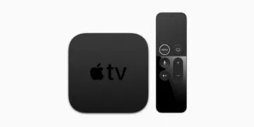 Apple TV 4K seen from above next to the black Siri Remote with a white ring around the Menu button – the 2017 model is now vintage