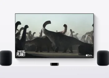 Apple TV HomePod: Apple TV 4K in front of a TV with a HomePod on each side as a stereo pair
