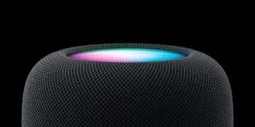 HomePod 2 Siri AI: HomePod in midnight against a black background, its top glowing in pink, white and turquoise
