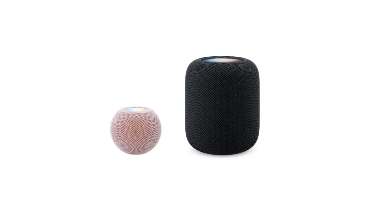 HomePod mini vs. HomePod: HomePod mini 2 in pink next to the much larger HomePod 2 in midnight, both shown to scale side by side