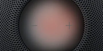 HomePod Sound Glow: top of a HomePod with a reddish glowing touch surface, plus and minus symbols and dark mesh around it