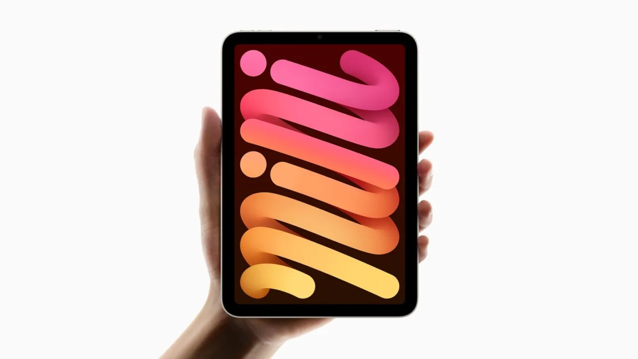 For the iPad mini 8 Smart Folio: the current iPad mini with a light frame held upright in one hand, its display showing a wallpaper of pink and orange ribbons