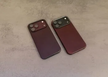 Nomad cases iPhone 18 Pro: Modern Leather Case and Traditional Leather Case in Burgundy side by side on a grey surface