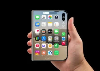 iPhone Duo volume buttons: folded iPhone Duo held in one hand, with the volume indicator showing on the outer display right below the two buttons on the top edge