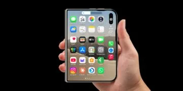 iPhone Duo volume buttons: folded iPhone Duo held in one hand, with the volume indicator showing on the outer display right below the two buttons on the top edge