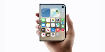 iPhone Duo delivery date: folded iPhone Duo held in one hand with the Home Screen on the outer display