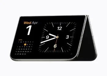 iPhone Duo demand: the foldable iPhone stands half open like a tent, showing a clock and a calendar in StandBy