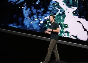 John Ternus design: Apple's current CEO on stage at the Apple keynote in October 2018 in front of a large display