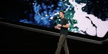 John Ternus design: Apple's current CEO on stage at the Apple keynote in October 2018 in front of a large display