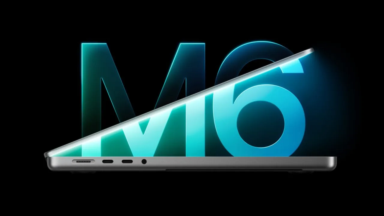 MacBook Pro M6 half open in side view in front of a glowing M6 lettering on a black background
