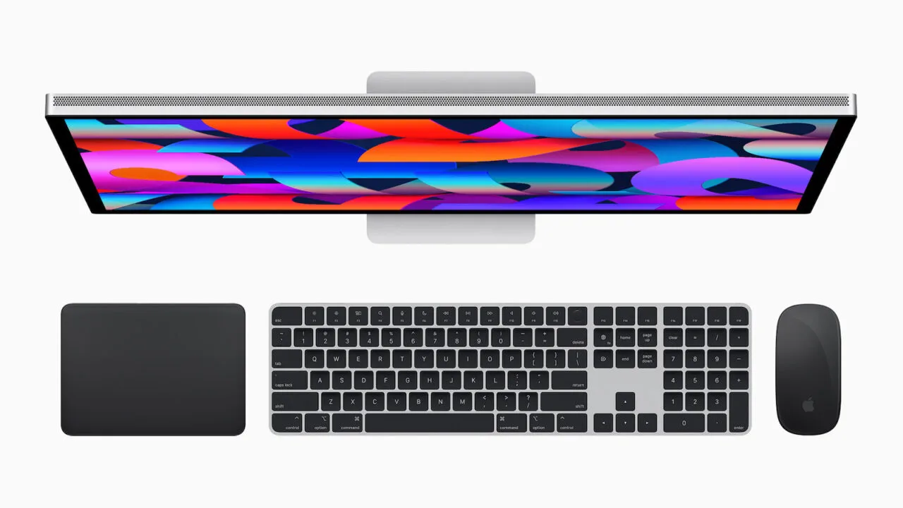 Magic Mouse Intel Macs: Studio Display from above with Magic Trackpad, Magic Keyboard and Magic Mouse in black