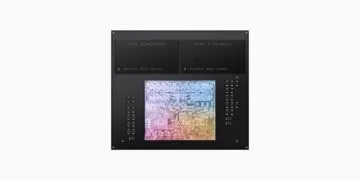 Memory crisis: Apple silicon chip on its package with two black memory modules above it, on a light grey background